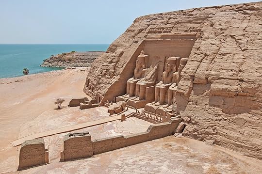 Aerial view over exterior entrance to ancient egyptian temple of Ramses II in Abu Simbel with giant statues to Lake Nasser, Nile cruise