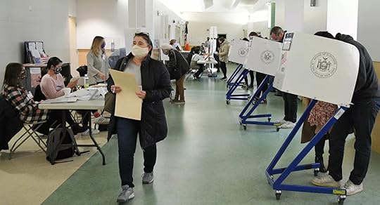 Voters cast their ballots in US presidential election on 3 November 2020