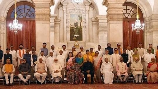 Prime Minister Narendra Modi in a group photograph with ministers during the swearing-in ceremony as part of Union cabinet expansion at Rashtrapati Bhawan in New Delhi on Wednesday. 