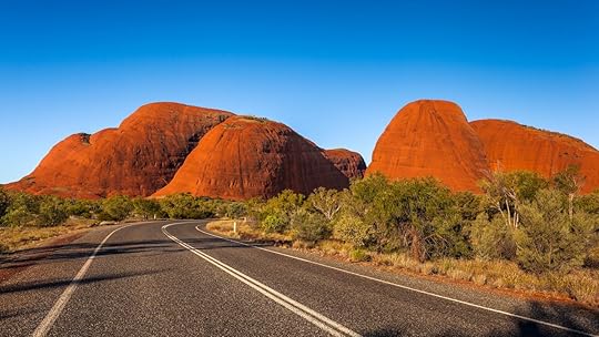 KATA TJUTA, AUSTRALIA - CIRCA AUGUST 2016: Road leading to the large domed formations of Kata Tjuta, Uluru-Kata Tjuta National Park, Northern Territory, Australia, The Red Centre Way
