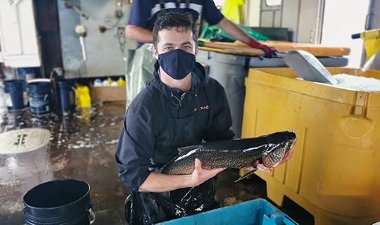Chef Jon Klip with freshly caught Lake Trout.