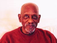 Harrison Dillard, in red sweater.