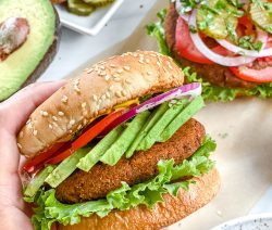 south west black bean burger with a burger and veggie ingredients in the background