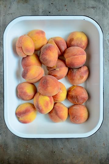 Halved peaches in a baking dish
