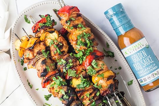 pork pineapple bbq kebabs skewers on a platter with golden bbq sauce