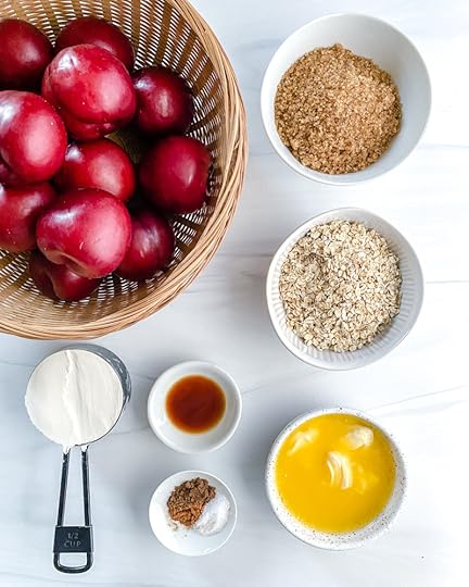 crisp plums ingredients in a white background