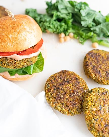 Three Chickpea Quinoa Burgers and a Burger with Bun