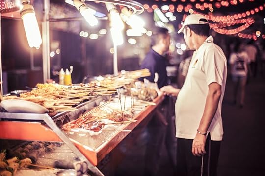 Streetside Asian food vendor in Kuala Lumpur