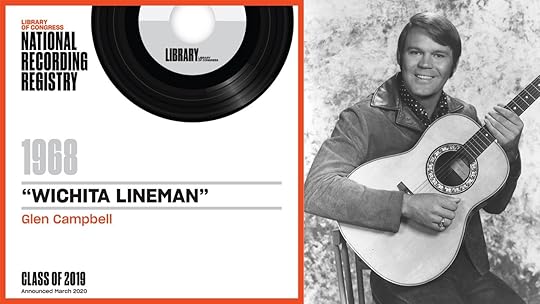Glen Campbell, posed with a guitar, in black and white promotional photograph