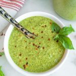 basil salad dressing ingredients in a white background
