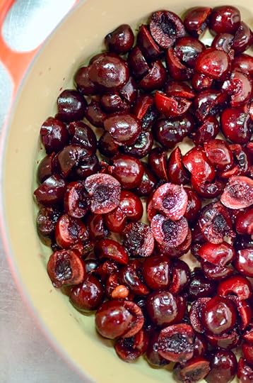 Pitted and chopped cherries in a pot.