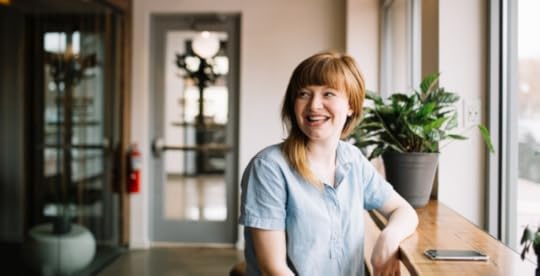 Happy woman at office