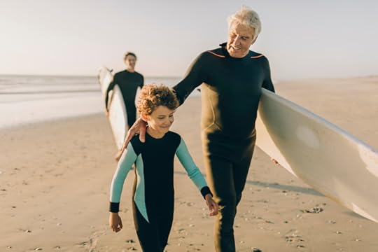 grandfather and grandson surfing staying active like the blue zones longest living generations