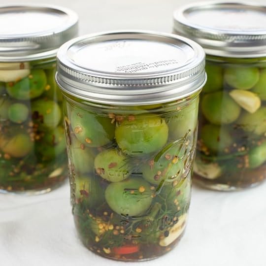 Pickled green cherry tomatoes.