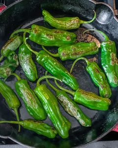 shishito peppers cooked in pan