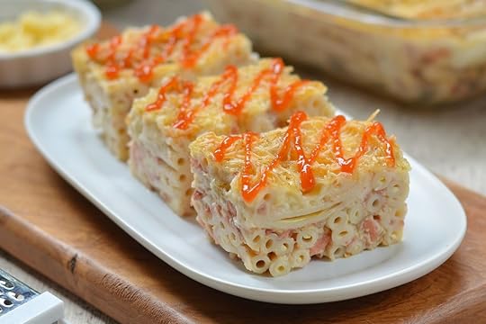 macaroni schotel is made of macaroni, cheese, milk, eggs cooked into one and then roasted until cooked., mac and cheese
