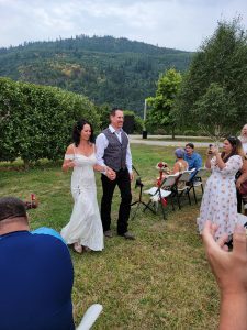 Jerome and Stephanie walk down the aisle 