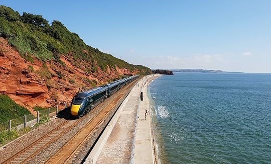 Dawlish United Kingdom August 3 2018 : Train pass between the Red cliff and the sea, Train journeys