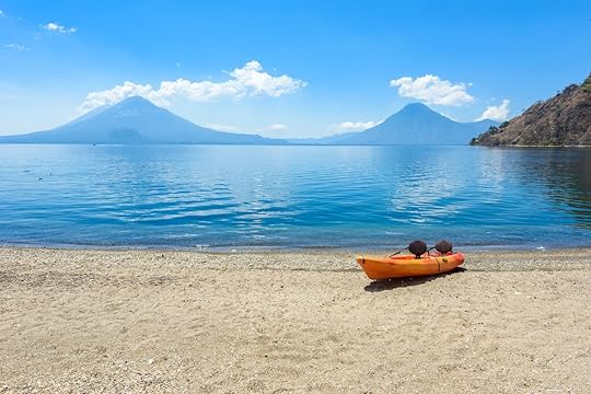 Paradise,Beach,With,Chair,And,Kayak,At,Lake,Atitlan,,Panajachel