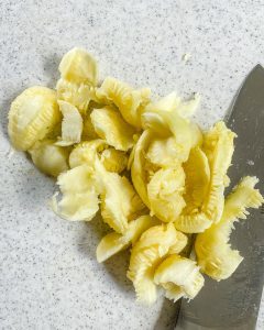 filling of zucchini collected on light background