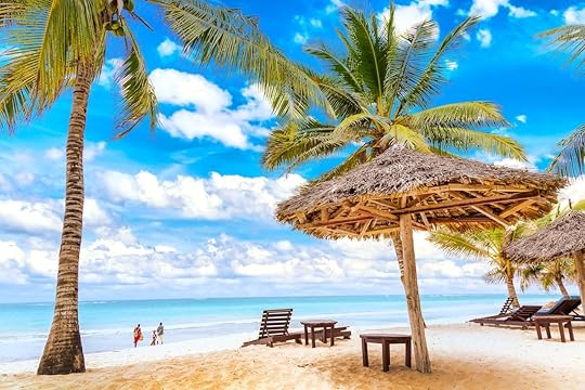 Sun,Loungers,Under,Umbrella,And,Palms,On,The,Sandy,Beach