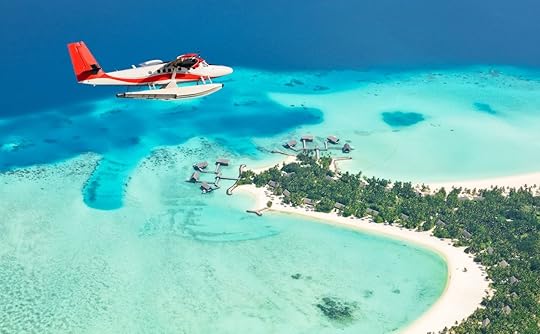 Sea,Plane,Flying,Above,Maldives,Islands