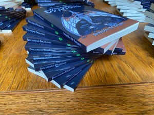 Discarded Dragons stacked books