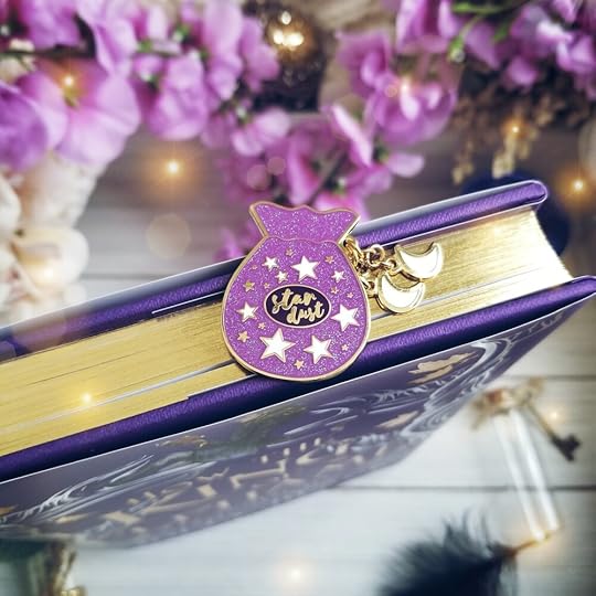 Pictured: Lucenna inspired Stardust pin with chain moon tassels.