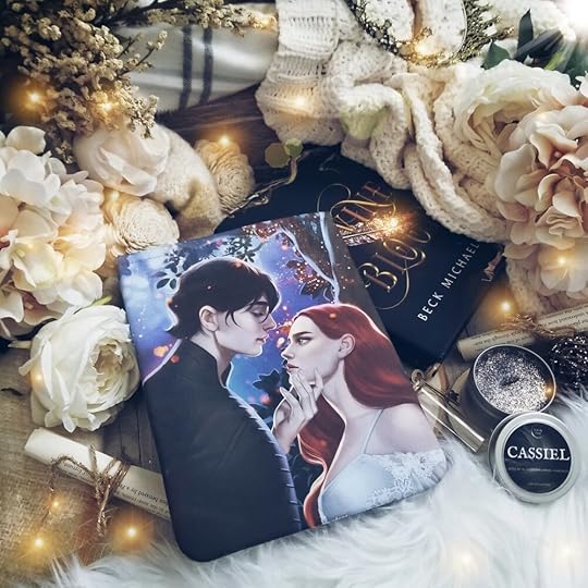Pictured: Cassiel and Dyna book sleeve. Cassiel candle.
