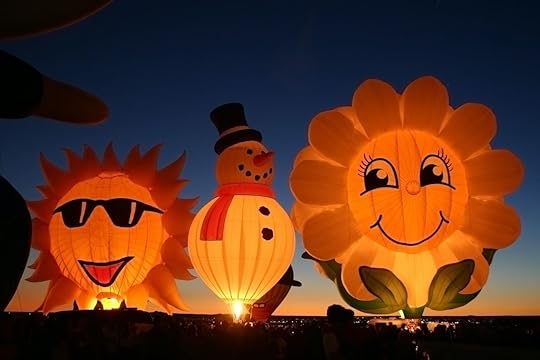 Glowing balloons in the sky at the Albuquerque International Balloon Festival