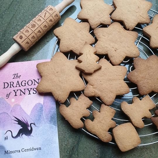 Baked biscuits, the rolling pin, and a copy of