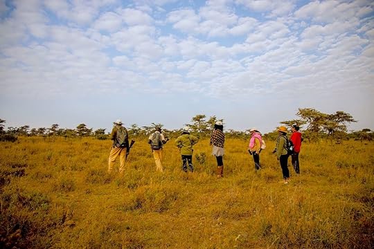Guides and travelers on a walking safari in Kenya