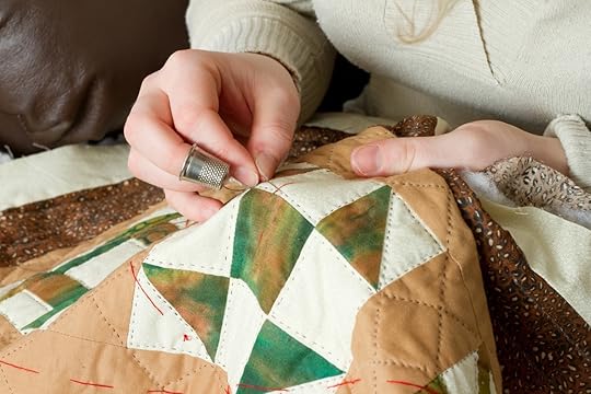 Young Woman's Hands with Thimble and Sewing Needle Quilting - The Inspired Sewist