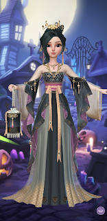 Suzhen's black snake dress accented with gold scales and ribbons