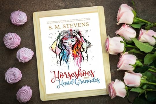 book cover horseshoes and hand grenades on tablet with pink roses and rosettes