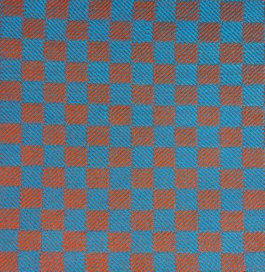 1/3 vs. 3/1 twill blocks swatch woven in blue and orange yarns, with brightly colored patches