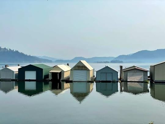 houseboats-reflected-glassy-lake-coeur-d-alene