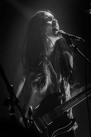May be a black-and-white image of one or more people, people playing musical instruments and guitar