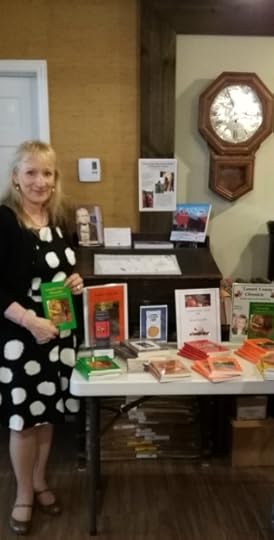 NLRM Arlene at book table