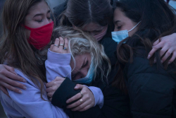 Mourners at a memorial for the 10 people killed in a mass shooting 32020at a Boulder Colo. grocery store.RachelWoolfWashPost