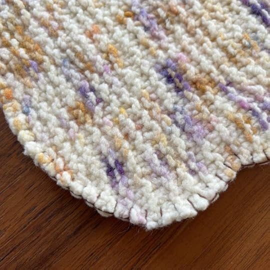 Embroidering onto felted yarn.