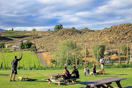 People relaxing outside at Cowiche Creek Brewing Company