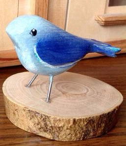 blue wooden bird