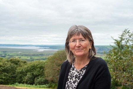 photo of Jean Gill on a Welsh hillside 
