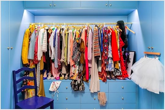 Clothes hanging in a recreation of apartment in Sex and the City