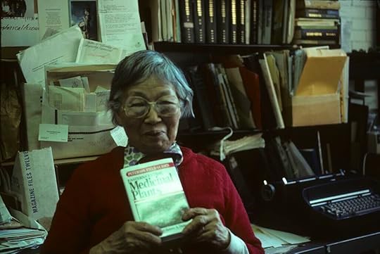 Dr. Shiu-ying Hu (1908-2012_ holding a copy of Steven Foster and Jim Duke's Field Guide to Medicinal Plants, first edition, soon after released in 1990.