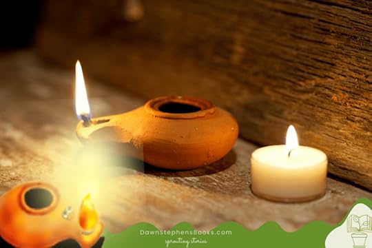 an oil lamp is a small clay vessel that fits in your hand