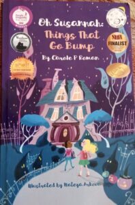 book cover of the children's chapter book oh susannah things that go bump written by carole p roman and reviewed on the segilola salami show podcast
