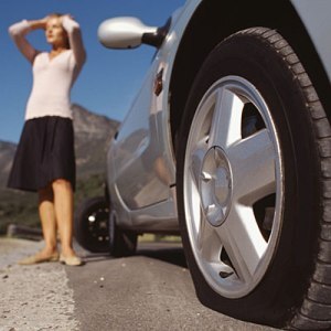 https://sierracarcare.files.wordpress.com/2014/08/flat-tire.jpg?w=300