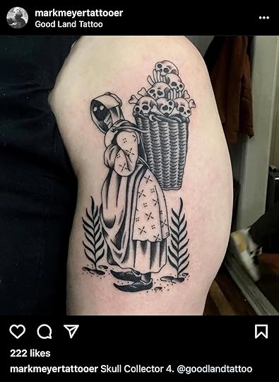 Black ink tattoo on light skinned upper arm of faceless person in flawy dress and apron carrying a basket of skulls on their back.